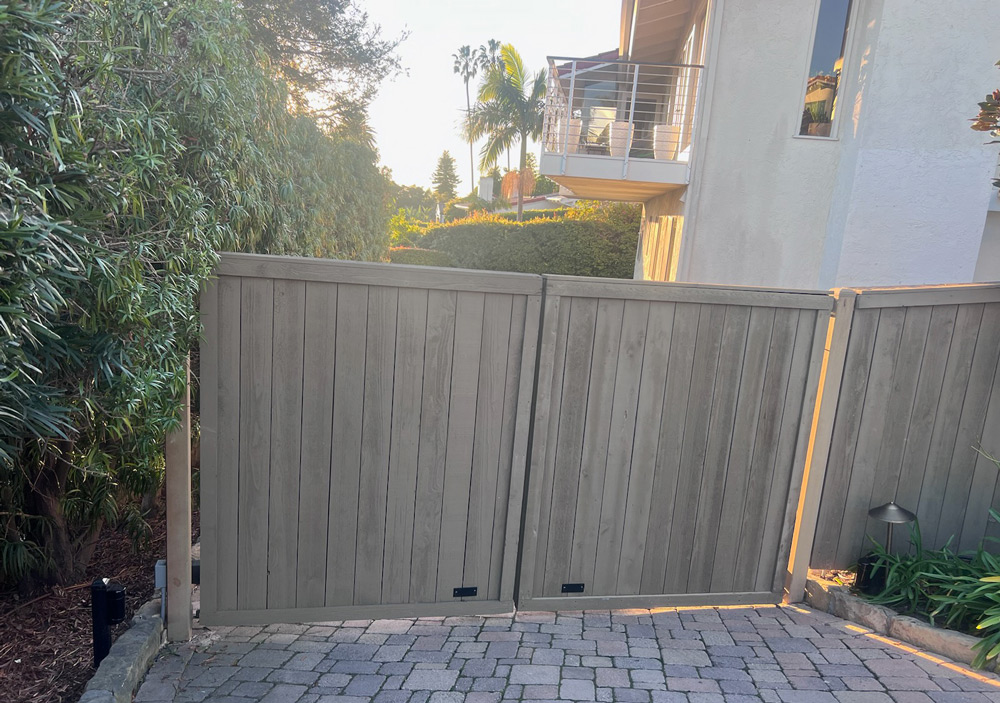 Light wood residential gate installation